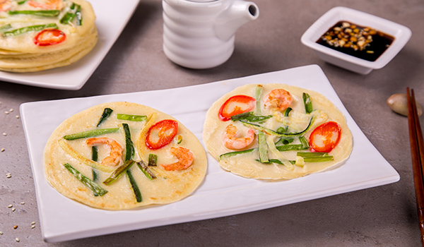 Korean pancakes with vegetables and shrimps